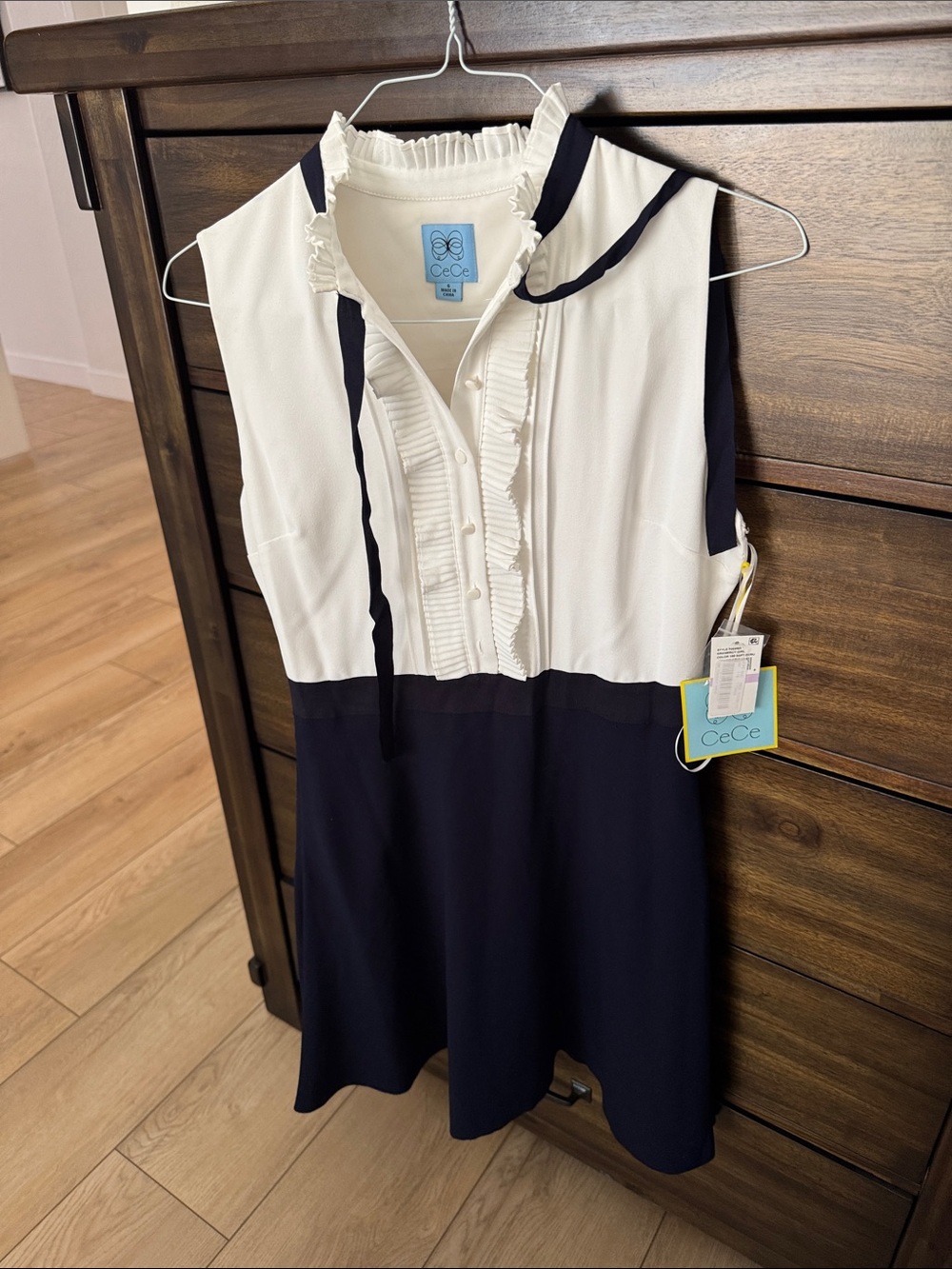 CeCe Cream and Navy Ruffle-Front Sleeveless Dress